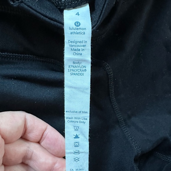 Lululemon 3/4 length leggings with diagonal mesh on back legs and front pockets - Picture 2 of 3